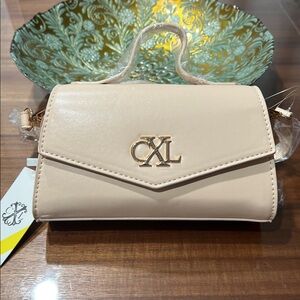 Christian Lacroix Cream Clutch with Gold Logo NWT